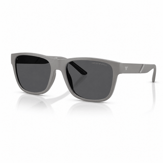 Angled view of authentic Emporio Armani EA4243 square sunglasses featuring a matte grey bio-based frame and dark grey polarized lenses. Available at Vision Optique, DLF Phase 4, Gurugram.