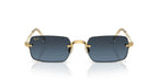Ray-Ban x A$AP Rocky RB3928 gold rimless sunglasses with blue gradient lenses, angled view