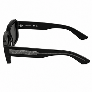 Side view of Calvin Klein CK25538S sunglasses highlighting the premium black acetate temples with signature Calvin Klein textured detailing.
