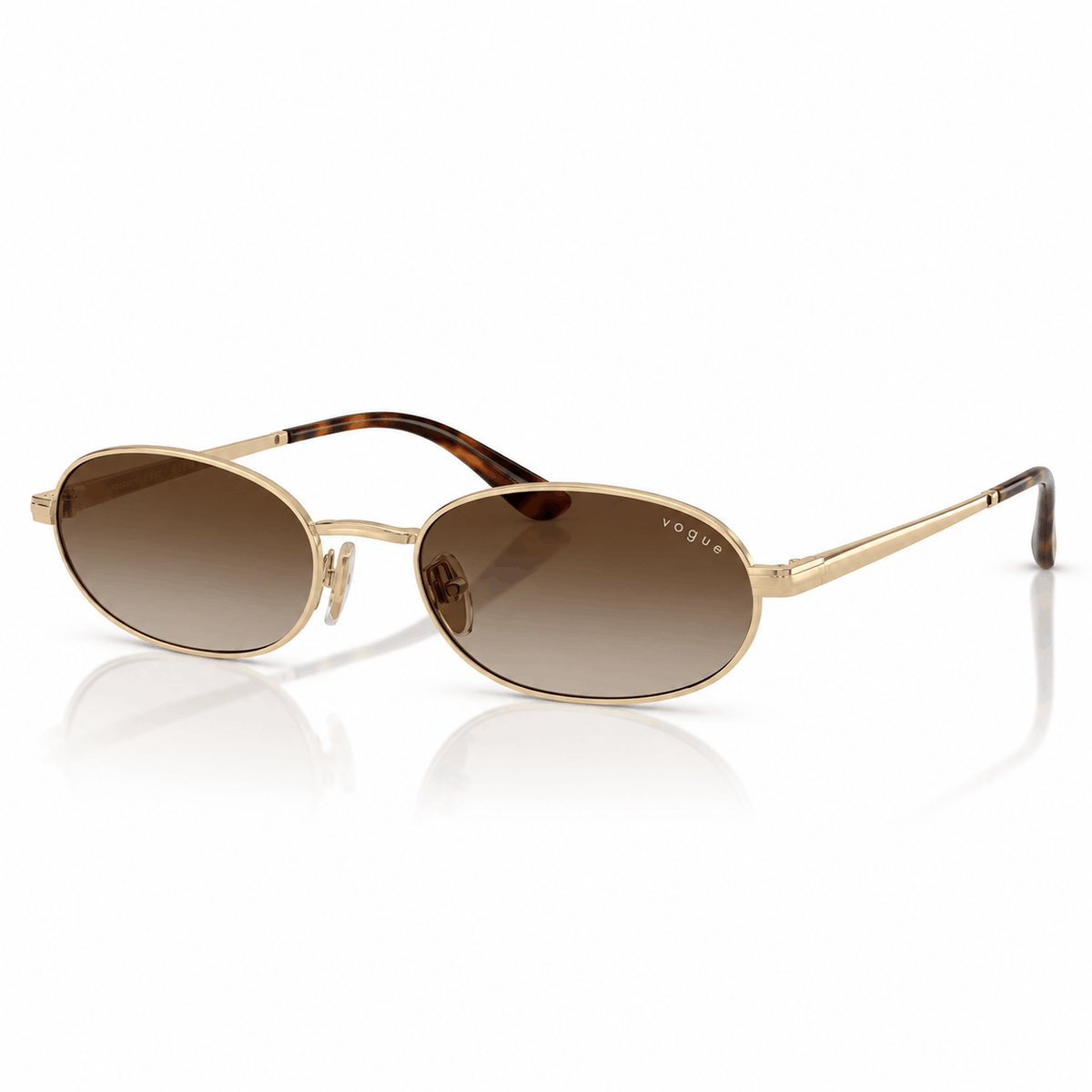 Vogue VO4353S oval sunglasses with gold frame and gradient brown lenses angled view