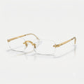 Three-quarter perspective view of Ray-Ban by A$AP Rocky RB3928V rimless rectangular optical glasses in polished Arista Gold