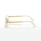 Side-profile angle of Ray-Ban x A$AP Rocky RB3928V showing slim gold metal temples with engraved Ray-Ban branding and clear tips
