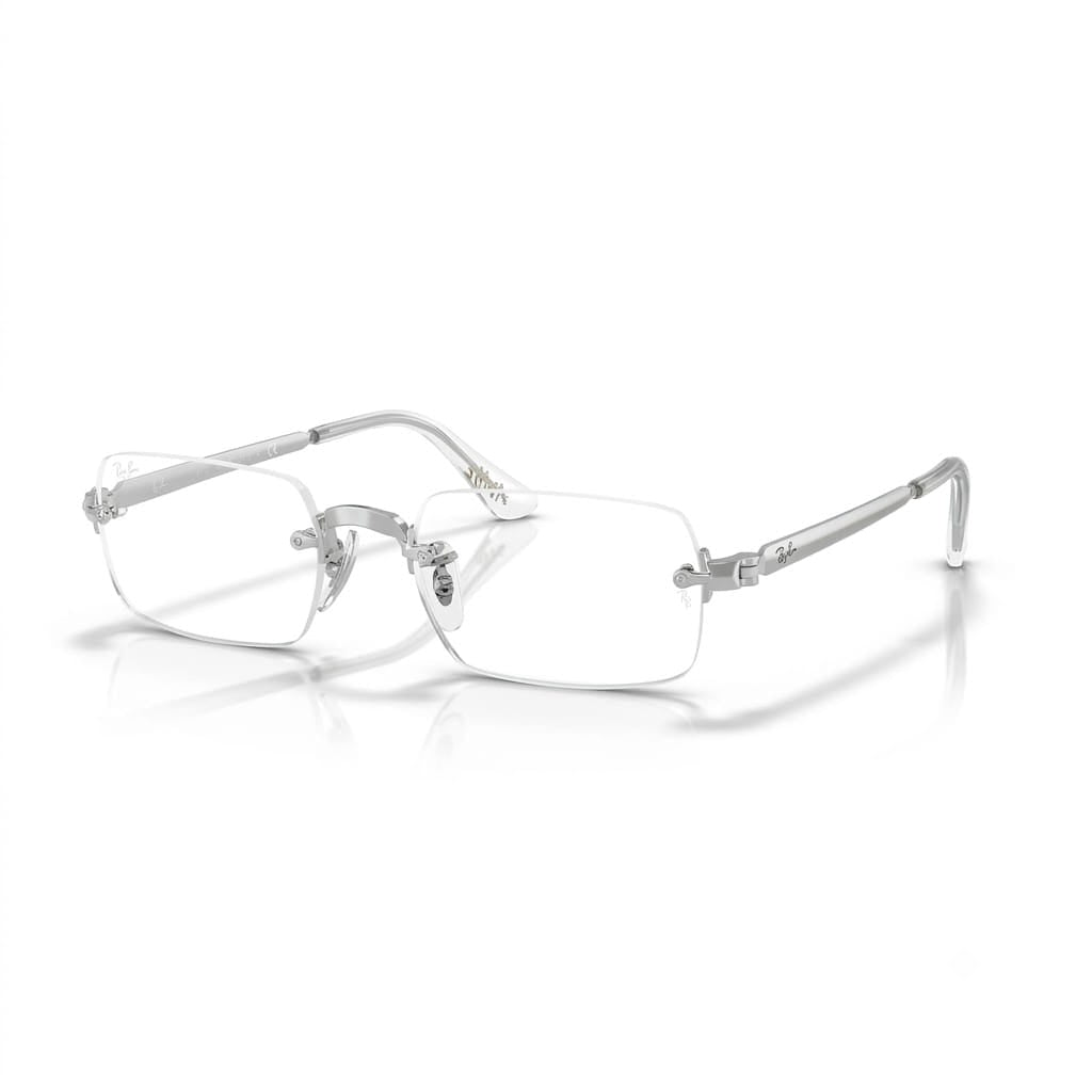Three-quarter perspective view of limited-edition Ray-Ban x A$AP Rocky RB3928V rimless rectangular optical glasses in polished silver