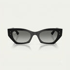 Side-profile angle of Ray-Ban Zena RB4430 sunglasses showing wide black acetate temples with white Ray-Ban signature logo