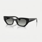 Three-quarter perspective view of Ray-Ban Zena RB4430 in polished black acetate with subtle grey gradient UV-protective lenses