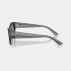 Side-profile angle of Ray-Ban Zena RB4430 highlighting sculpted wide transparent grey temples and silver Ray-Ban signature logo