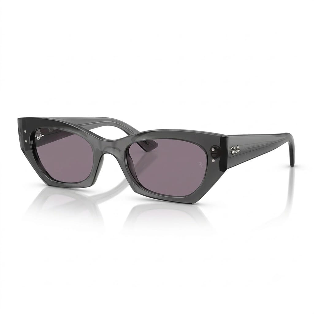 Three-quarter perspective view of Ray-Ban Zena RB4430 angular cat-eye sunglasses in glossy transparent grey with violet lenses